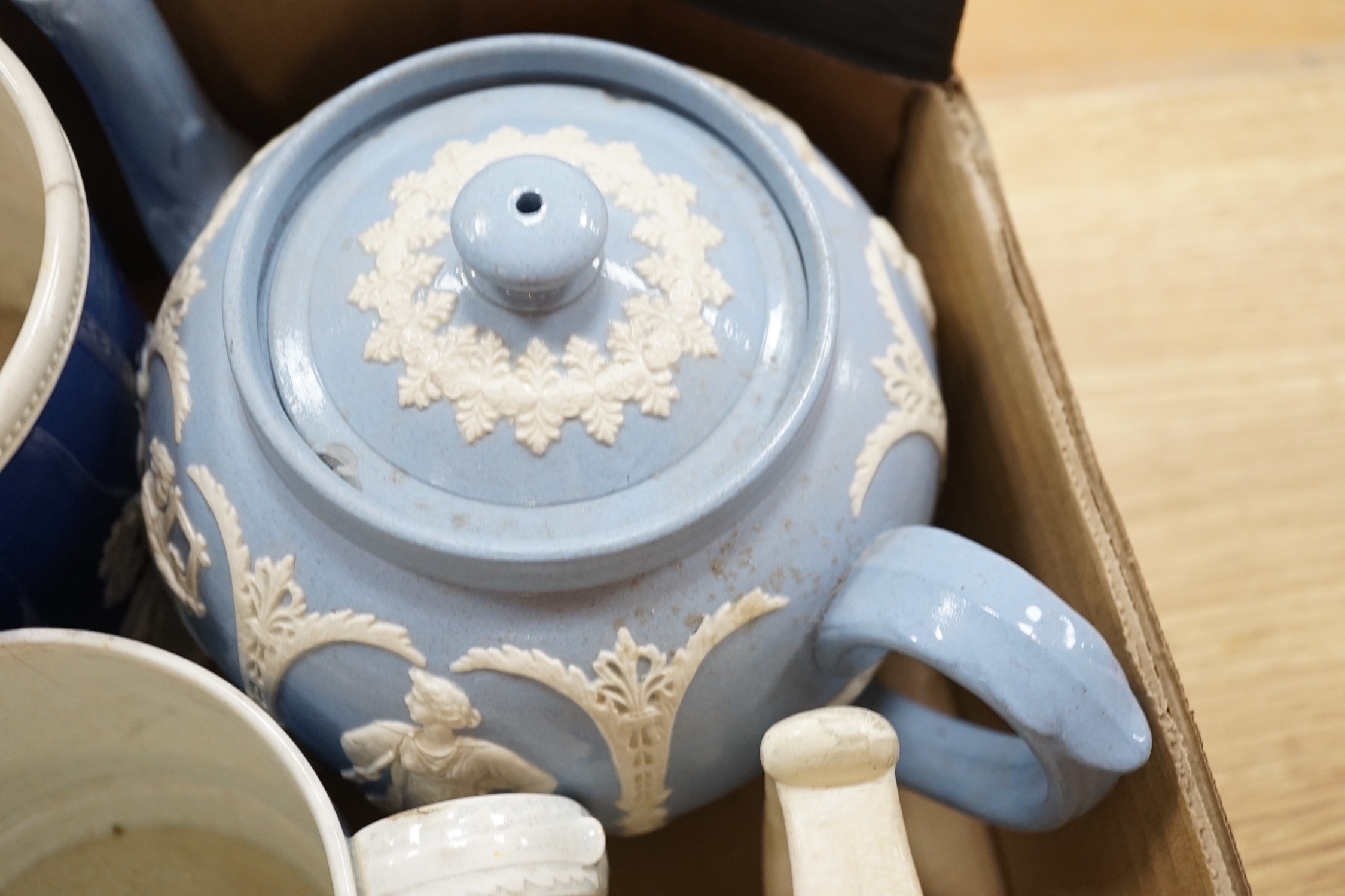 A large quantity of various teapots